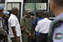 (Dieu Nalio Chery/ Associated Press ) - Members of Haiti’s dissolved army arrive to a court after being arrested during a march on Friday in Port-au-Prince, Haiti, Monday, May 21, 2012. A pro-army march on Friday began peacefully but turned violent in the afternoon when people began throwing rocks at United Nations peacekeepers and shots were later fired outside an old military base. Police arrested demonstrators on a range of charges that included possession of illegal weapons, not having paperwork for driving motorcycles and assault on police officers.