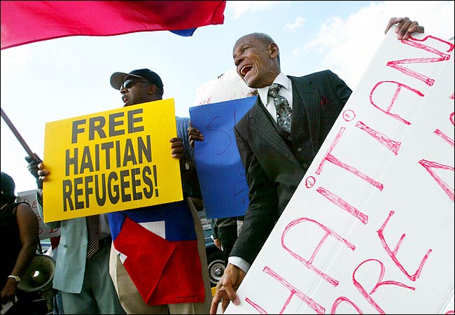 haitians held 1.jpg (54134 bytes)
